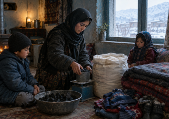 A woman weighs coal on a scale as two children watch inside a snow-covered home